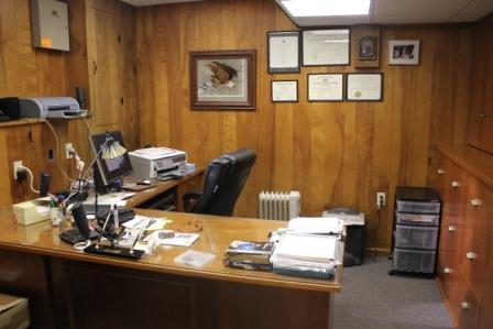 64 Devils Den Road Burgettstown, PA 15021 - Photo 10 of 18 Den. The Den in the lower level is utilized as an office with built-in file cabinets