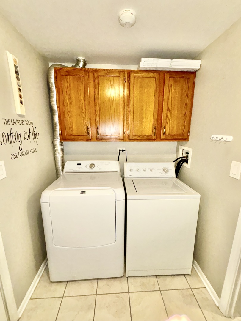 8241 Ripple Ridge Darien, IL 60561 - Photo 12 of 24 a utility room with dryer and washer