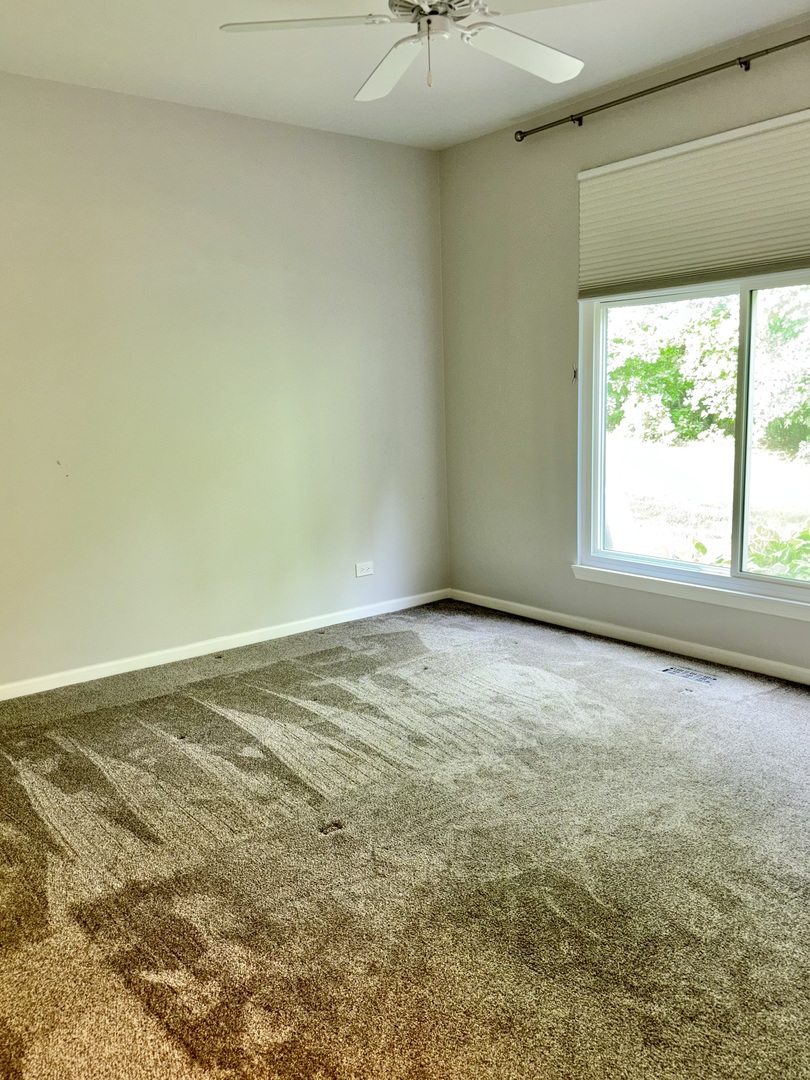 8241 Ripple Ridge Darien, IL 60561 - Photo 16 of 24 an empty room with a window