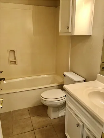 a bathroom with a toilet and a sink