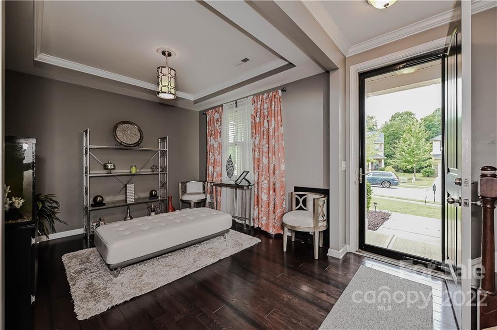 10311 Atkins Ridge Drive Charlotte, NC 28213 - Photo 2 of 18 a bedroom with a large bed and a window