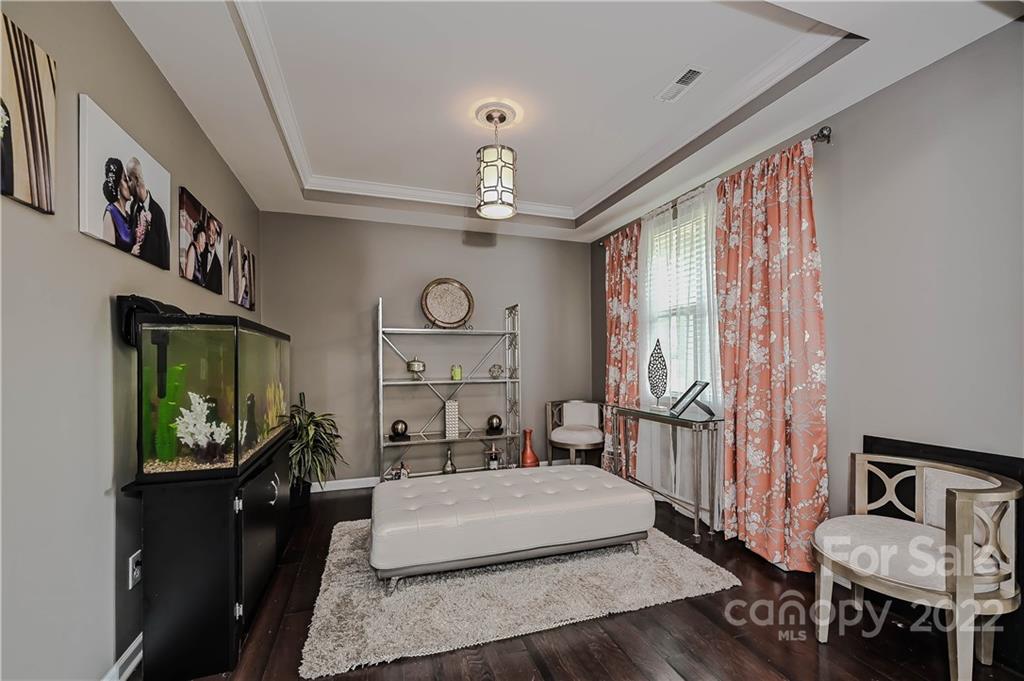 10311 Atkins Ridge Drive Charlotte, NC 28213 - Photo 3 of 18 a living room with furniture and a window