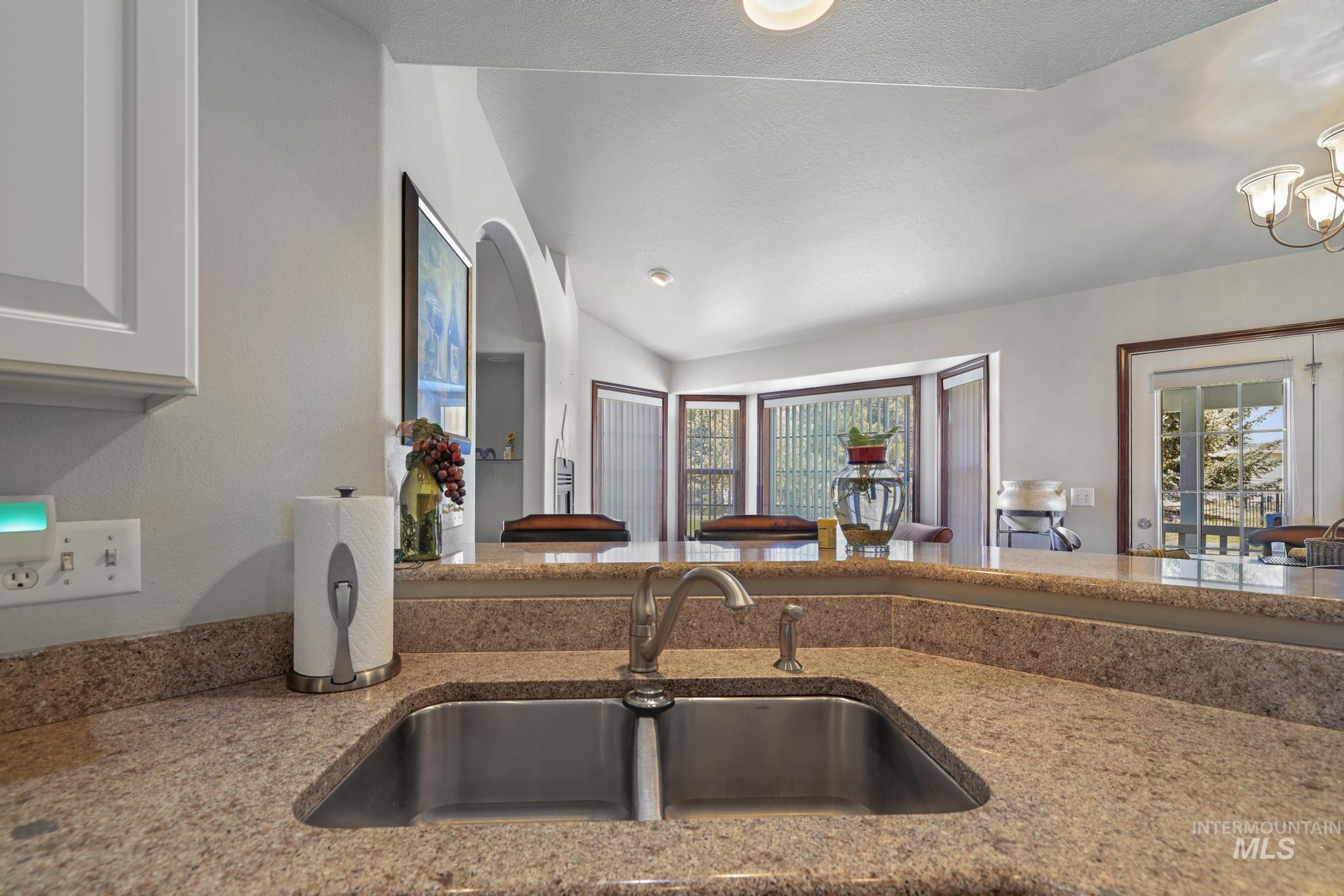 1558 Brookside Loop Twin Falls, ID 83301 - Photo 15 of 47 Kitchen sink with a stainless steel double basin and a brushed nickel faucet