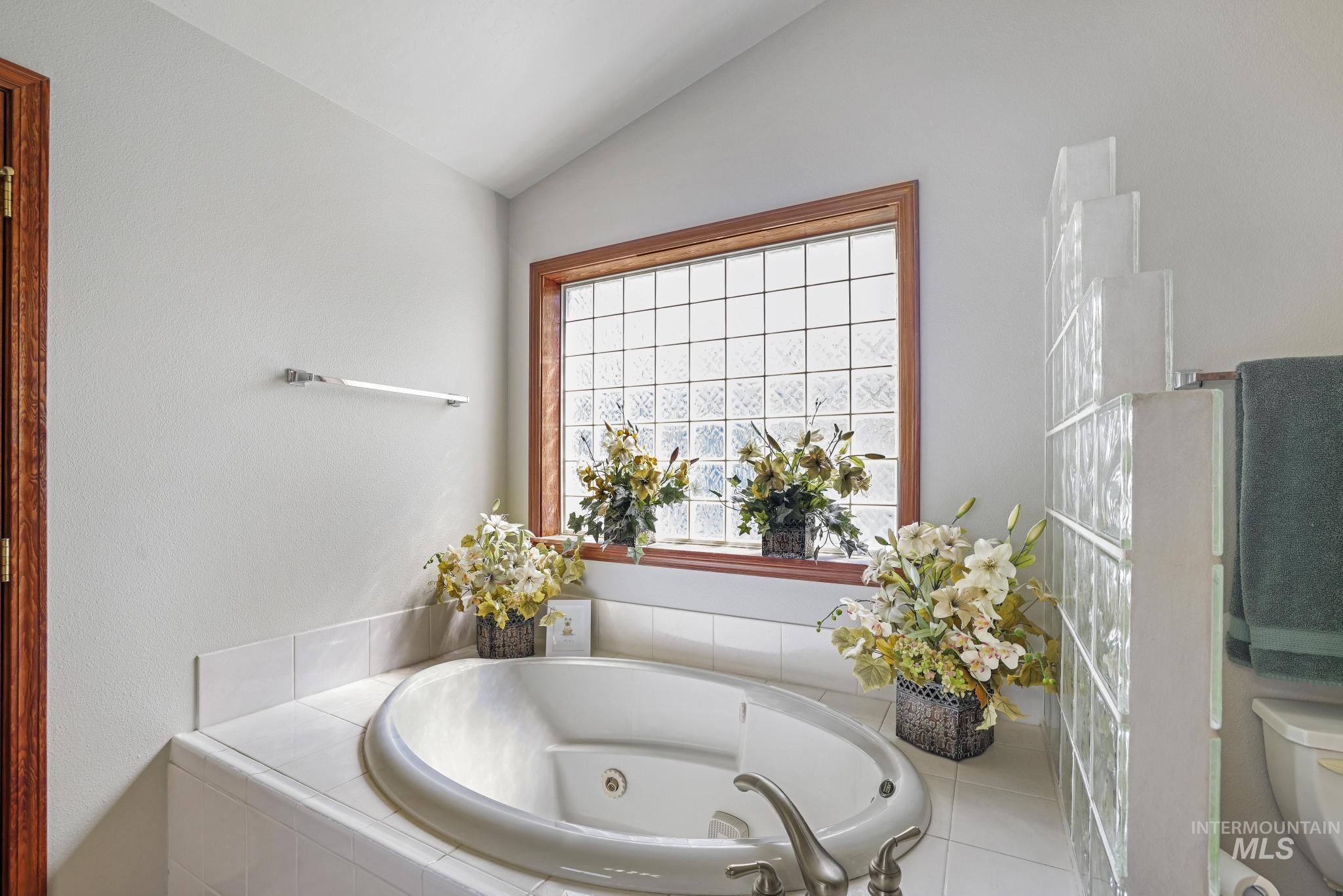 1558 Brookside Loop Twin Falls, ID 83301 - Photo 21 of 47 Built-in soaking tub with deck-mounted brushed nickel fixtures