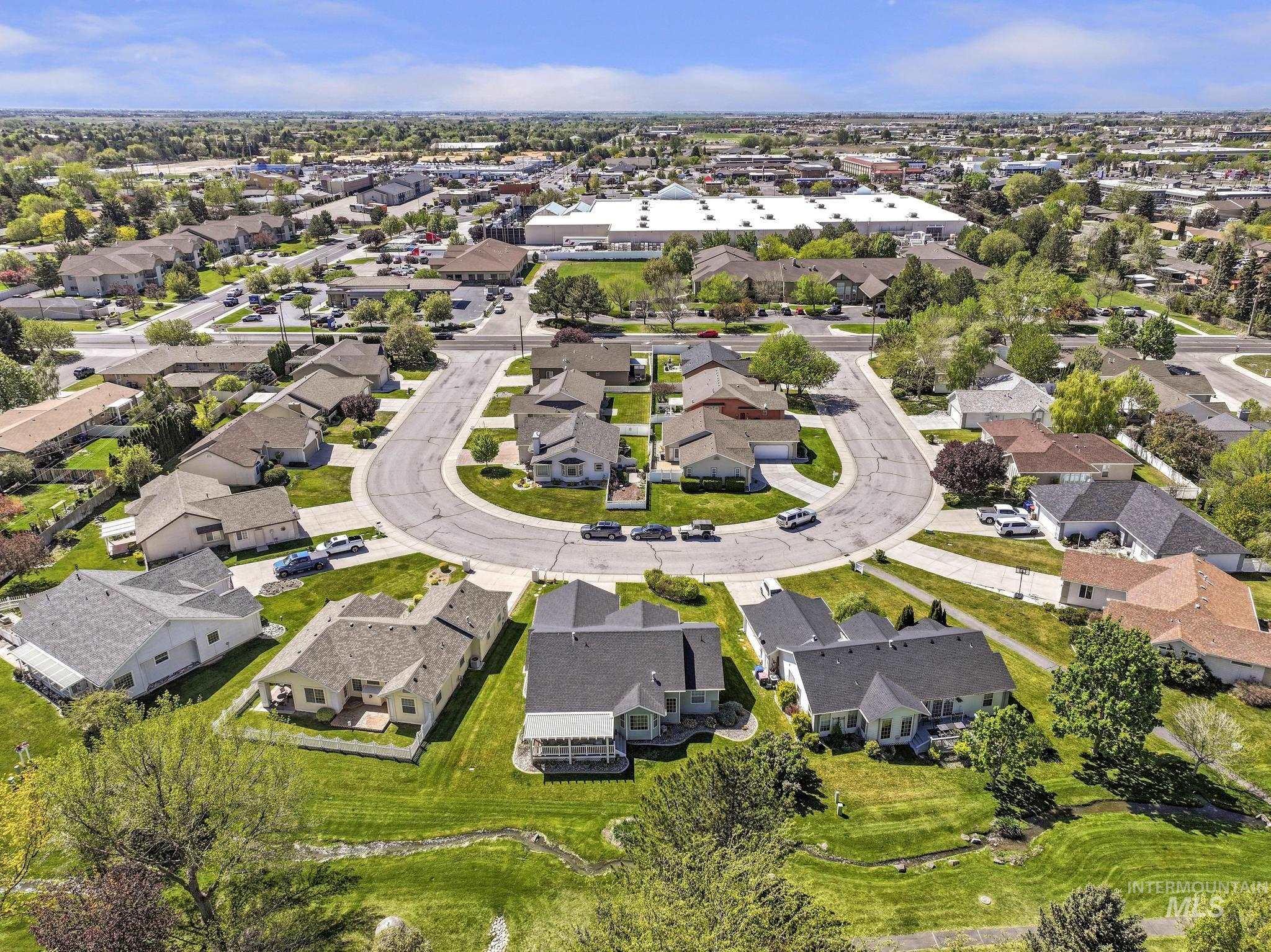 1558 Brookside Loop Twin Falls, ID 83301 - Photo 40 of 47 Aerial perspective showcasing a residential cul-de-sac with single-story homes