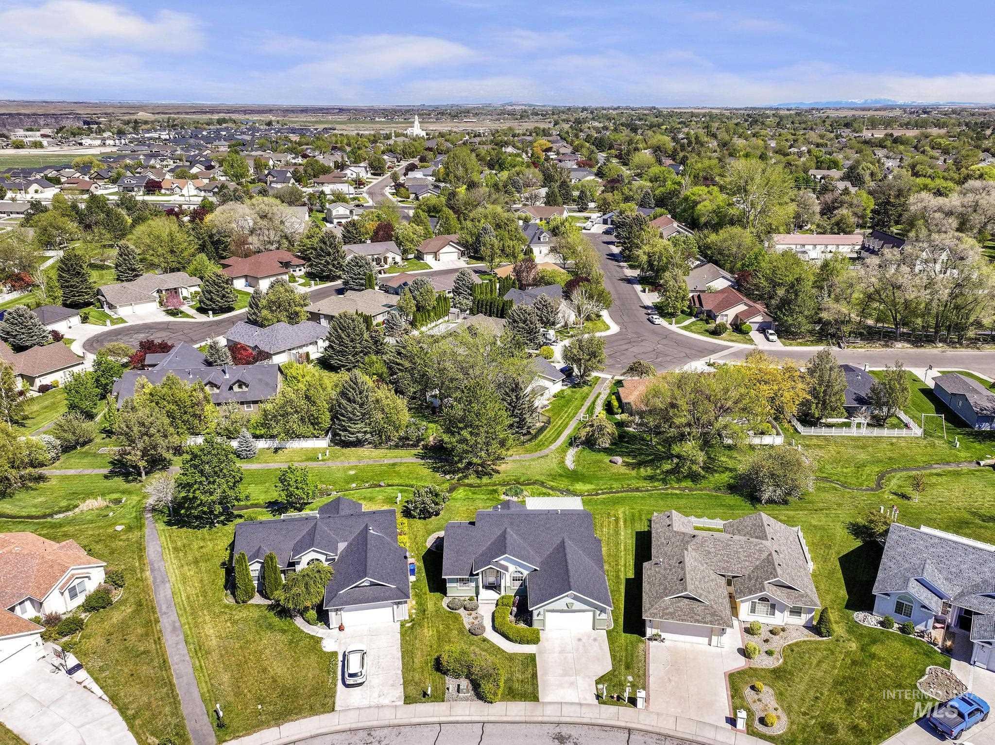 1558 Brookside Loop Twin Falls, ID 83301 - Photo 42 of 47 Residential neighborhood featuring mature trees and a curvilinear street layout