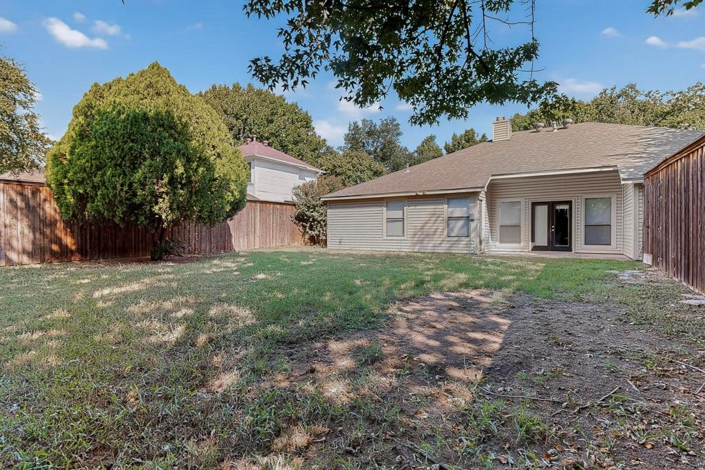820 Charter Oak Street Allen, TX 75002 - Photo 35 of 37 Fenced backyard with french doors