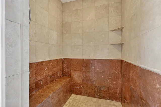 a view of room with wooden floor