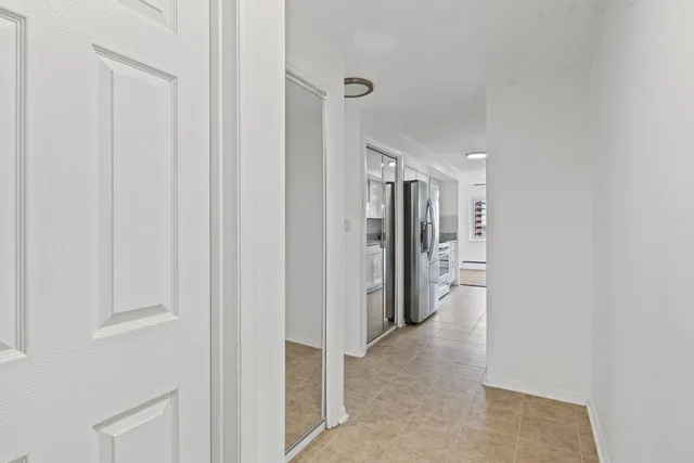 a kitchen with stainless steel appliances a refrigerator and a sink