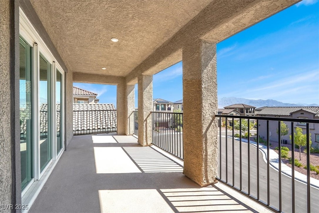 8033 Skye Foxx Street Las Vegas, NV 89166 - Photo 18 of 25 Balcony featuring a residential view
