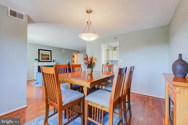 a view of a livingroom with furniture and wooden floor