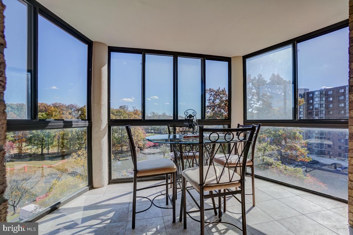 15101 Interlachen Drive, Unit 1625 Silver Spring, MD 20906 - Photo 10 of 32 Sunroom with great views