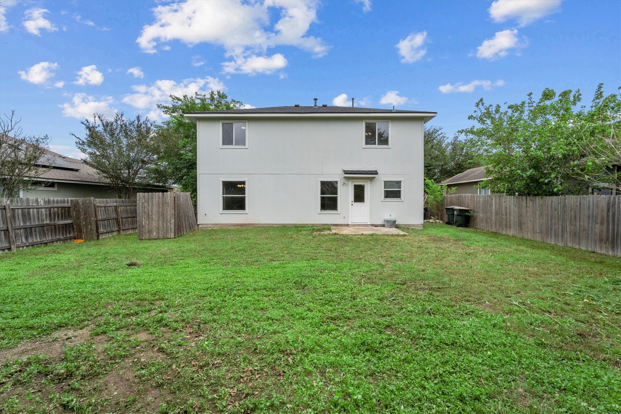 172 Discovery Kyle, TX 78640 - Photo 16 of 21 Spacious backyard with room to play, garden, or create your ideal outdoor retreat.