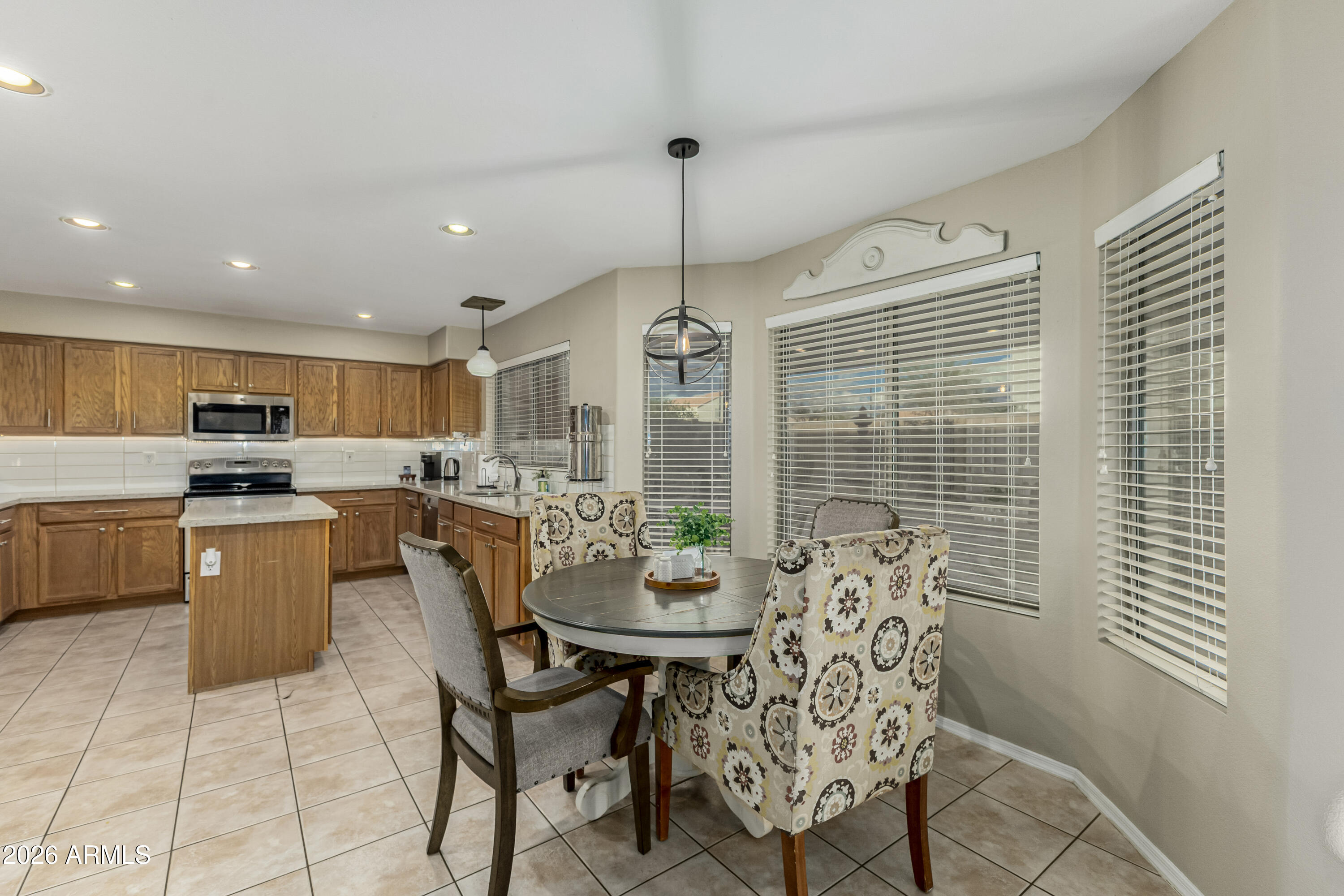 1737 South Talbot Mesa, AZ 85209 - Photo 10 of 35 a dining room with furniture and window