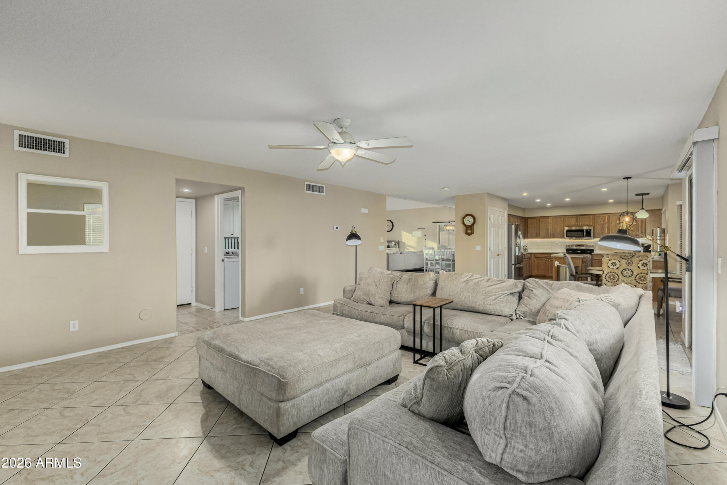 1737 South Talbot Mesa, AZ 85209 - Photo 15 of 35 a living room with furniture and a chandelier