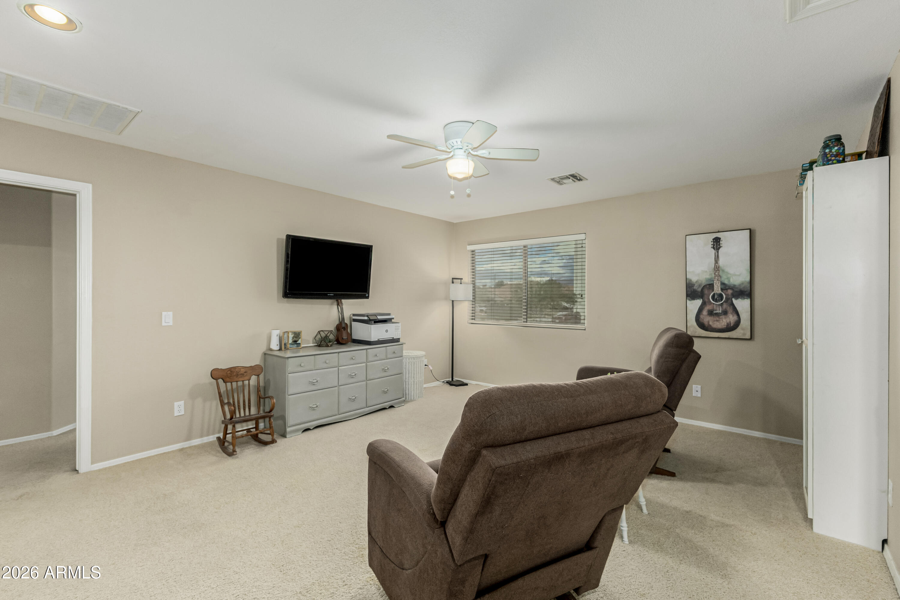 1737 South Talbot Mesa, AZ 85209 - Photo 19 of 35 a living room with furniture and a flat screen tv