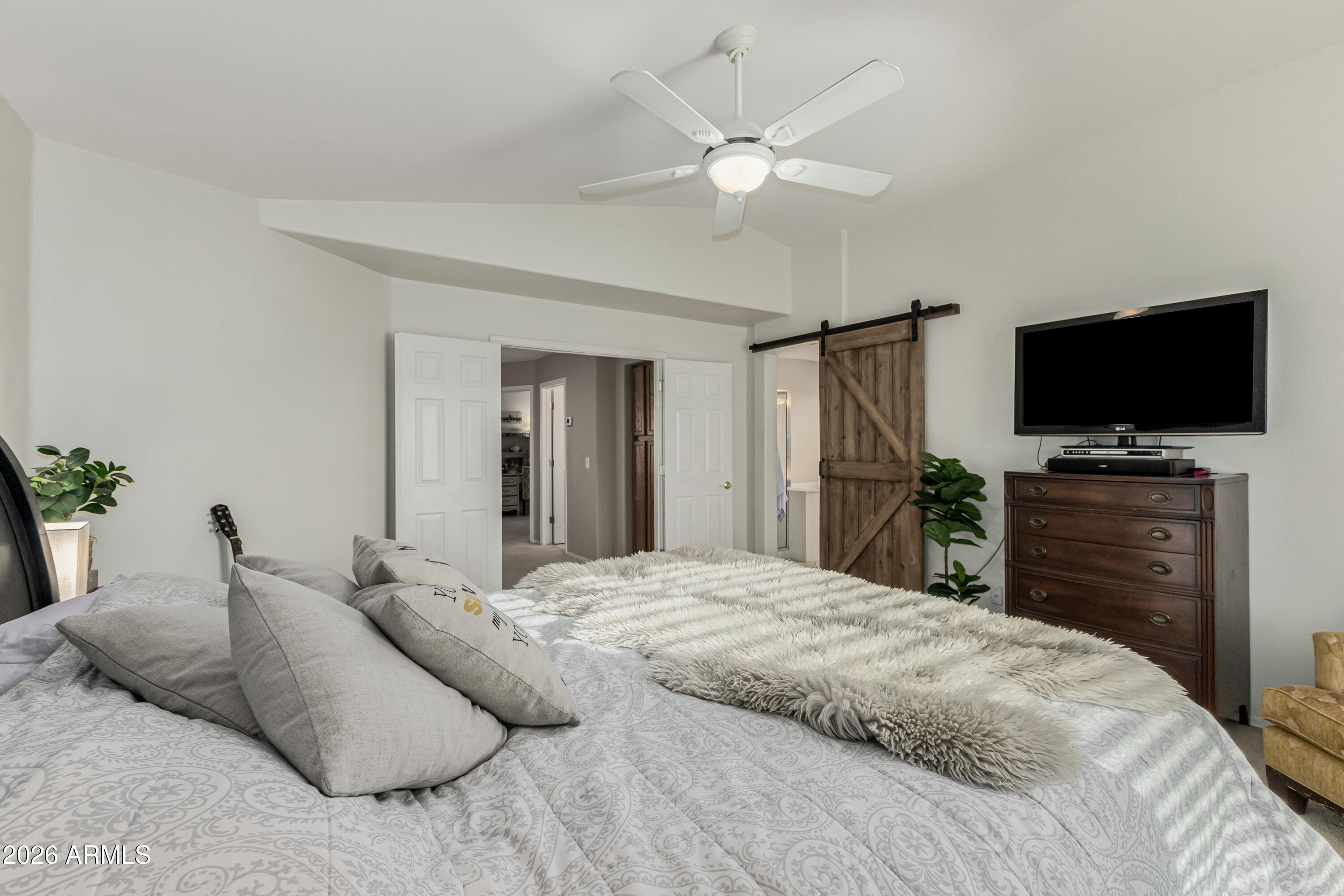 1737 South Talbot Mesa, AZ 85209 - Photo 20 of 35 a bedroom with a bed and a flat screen tv