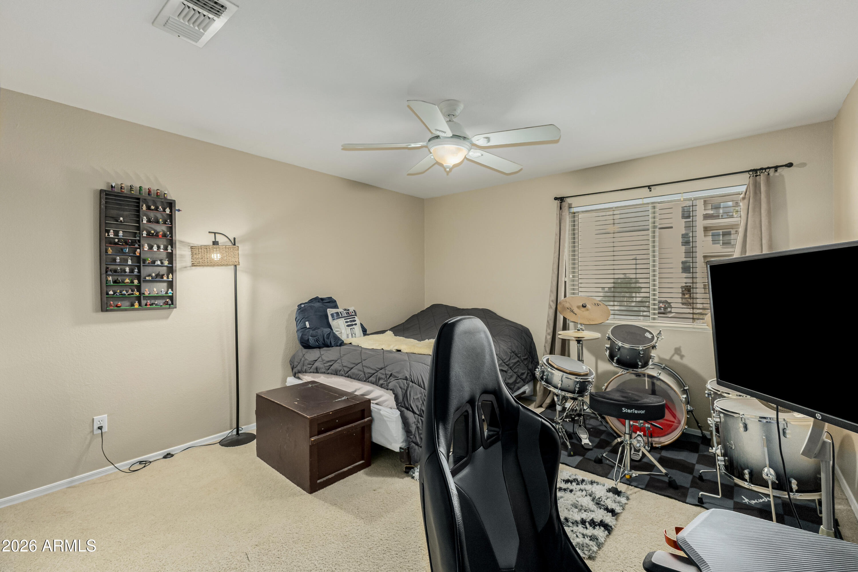 1737 South Talbot Mesa, AZ 85209 - Photo 24 of 35 a living room with furniture and a flat screen tv