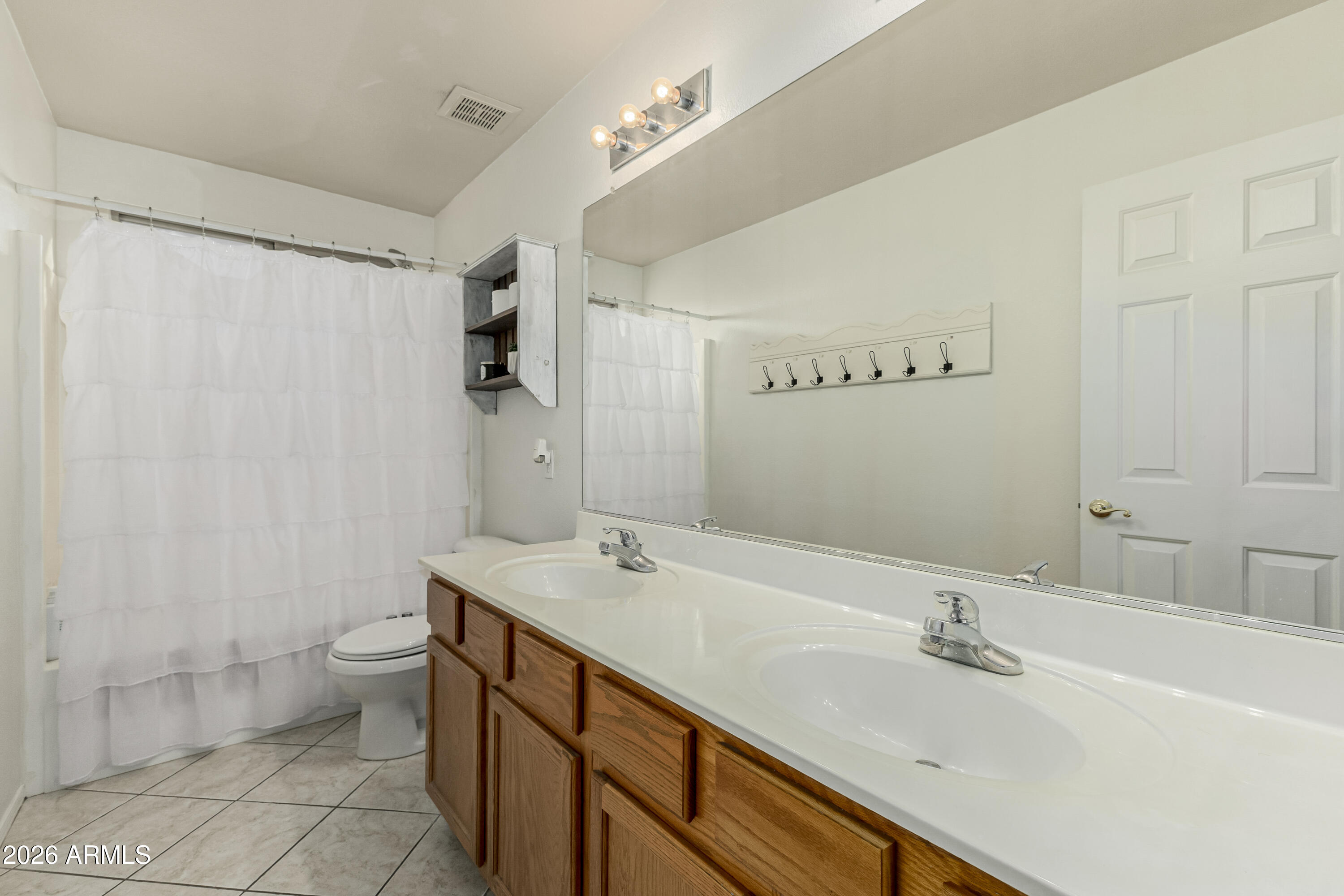 1737 South Talbot Mesa, AZ 85209 - Photo 26 of 35 a bathroom with a sink toilet and shower