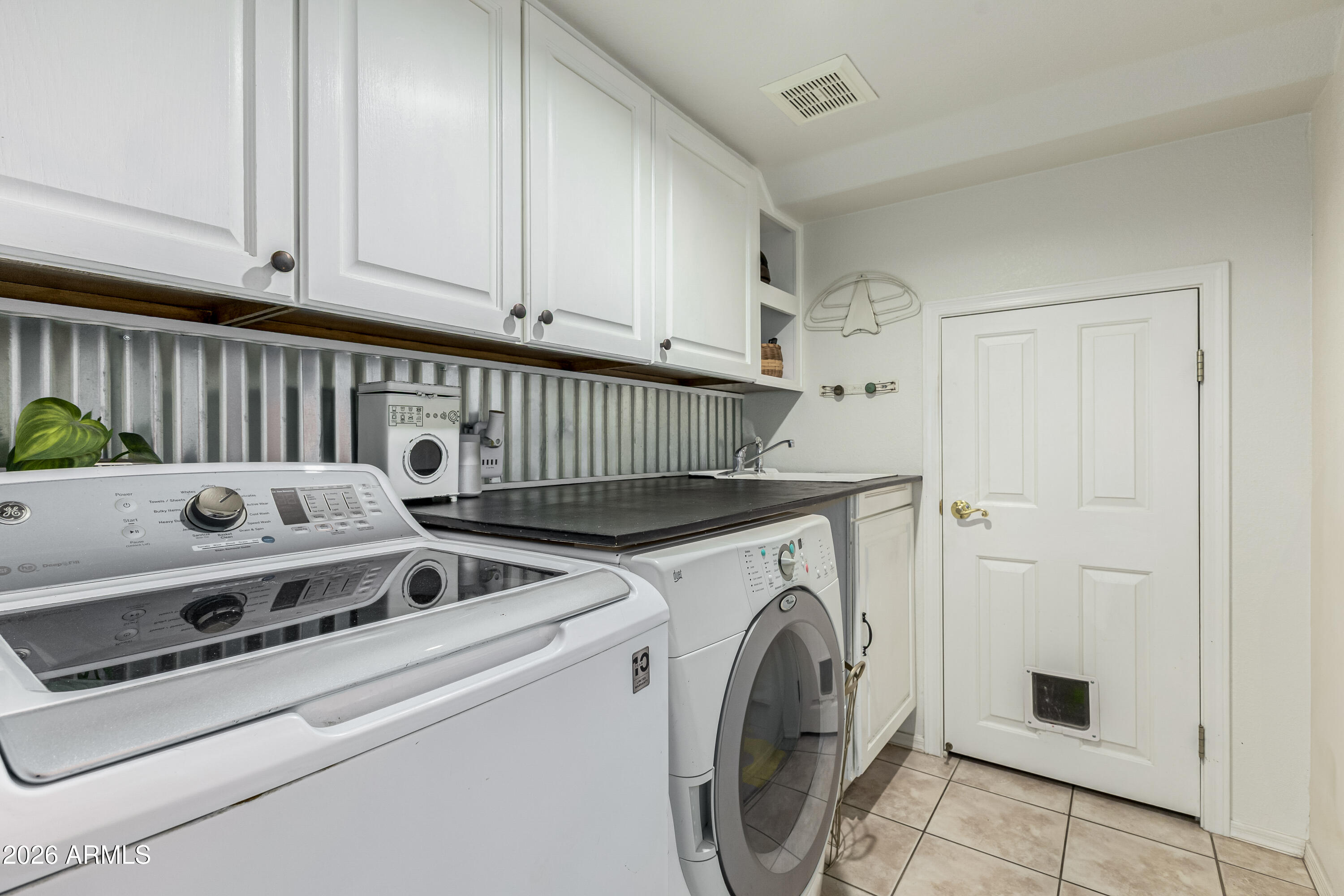 1737 South Talbot Mesa, AZ 85209 - Photo 27 of 35 a utility room with dryer and washer
