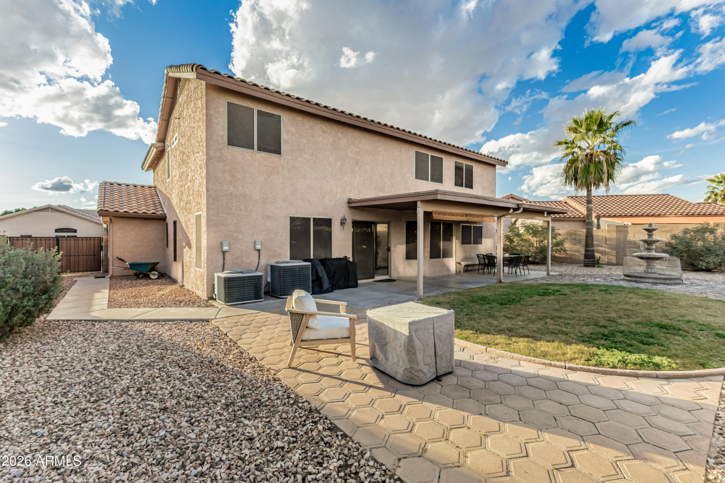 1737 South Talbot Mesa, AZ 85209 - Photo 29 of 35 a front view of a house with a garden