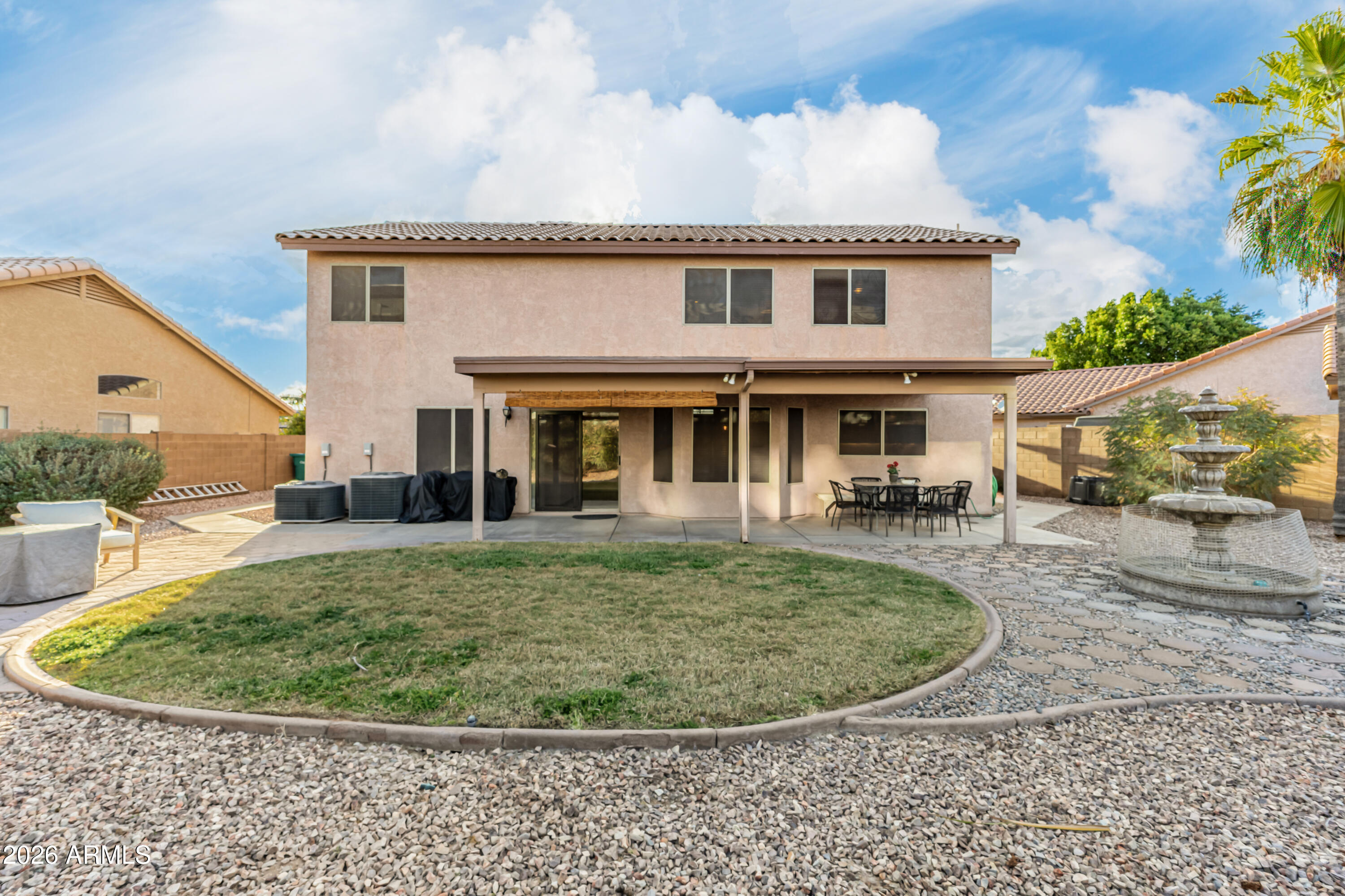1737 South Talbot Mesa, AZ 85209 - Photo 30 of 35 a view of a house with a backyard porch and sitting area