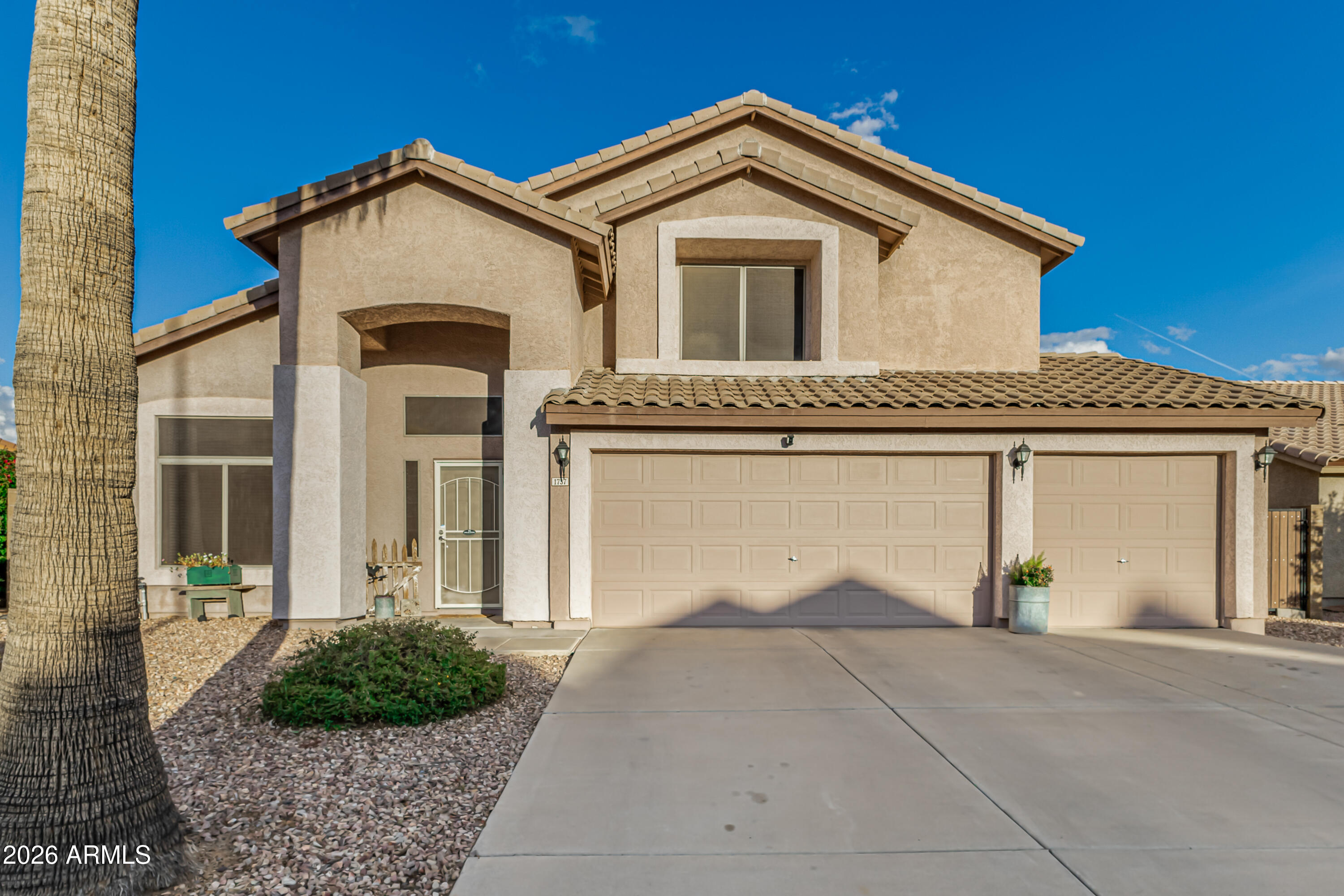 1737 South Talbot Mesa, AZ 85209 - Photo 5 of 35 a front view of a house with garden