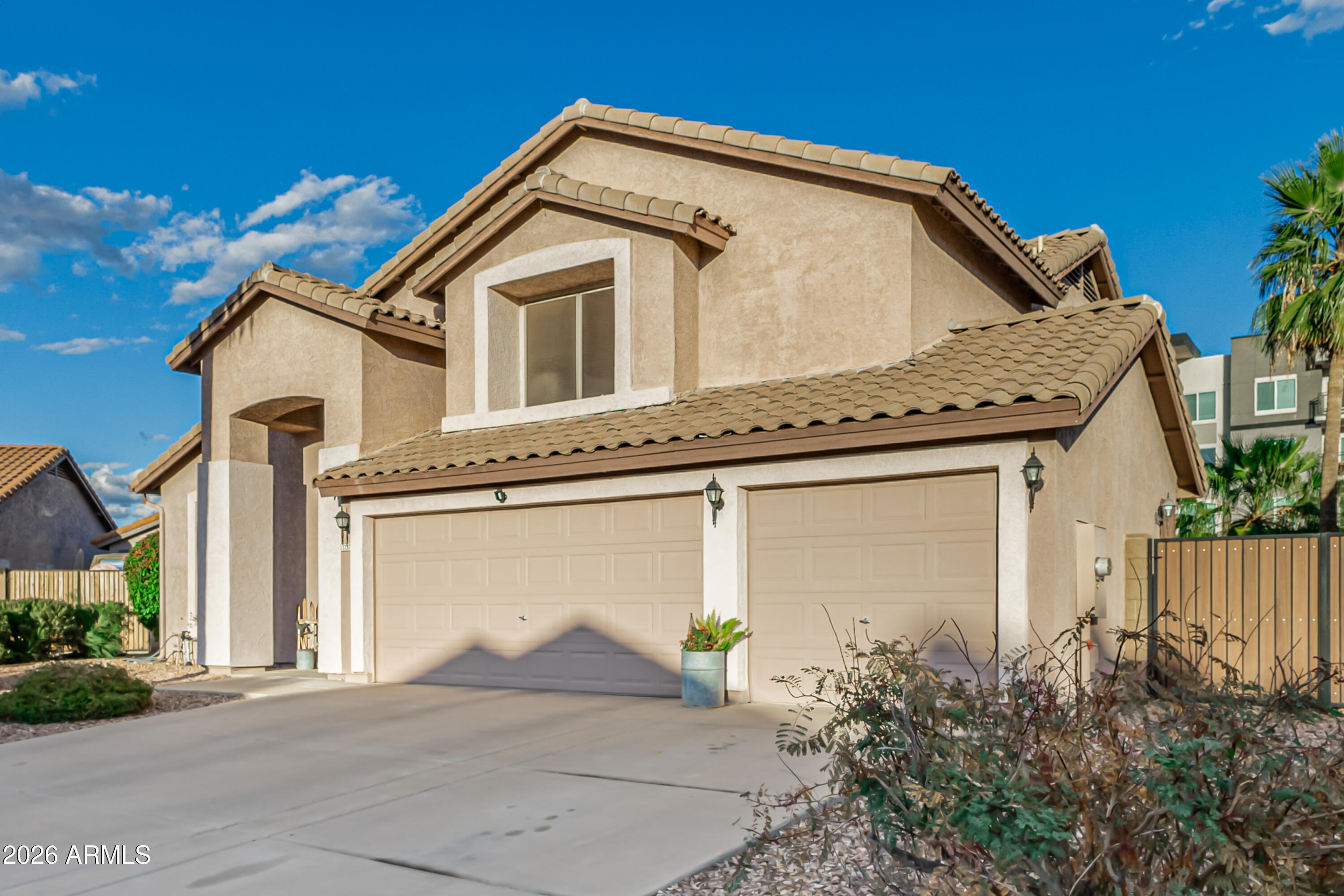 1737 South Talbot Mesa, AZ 85209 - Photo 6 of 35 a view of a house with a garage