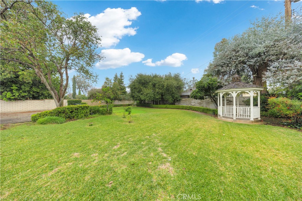 2835 Devonport Road San Marino, CA 91108 - Photo 45 of 54 a front view of a house with a yard