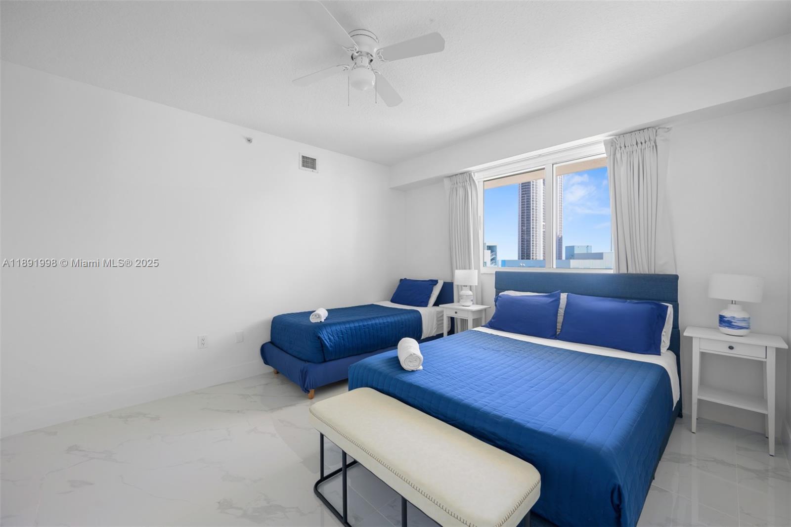 18100 North Bay Road, Unit 708 Sunny Isles Beach, FL 33160 - Photo 19 of 26 a living room with furniture