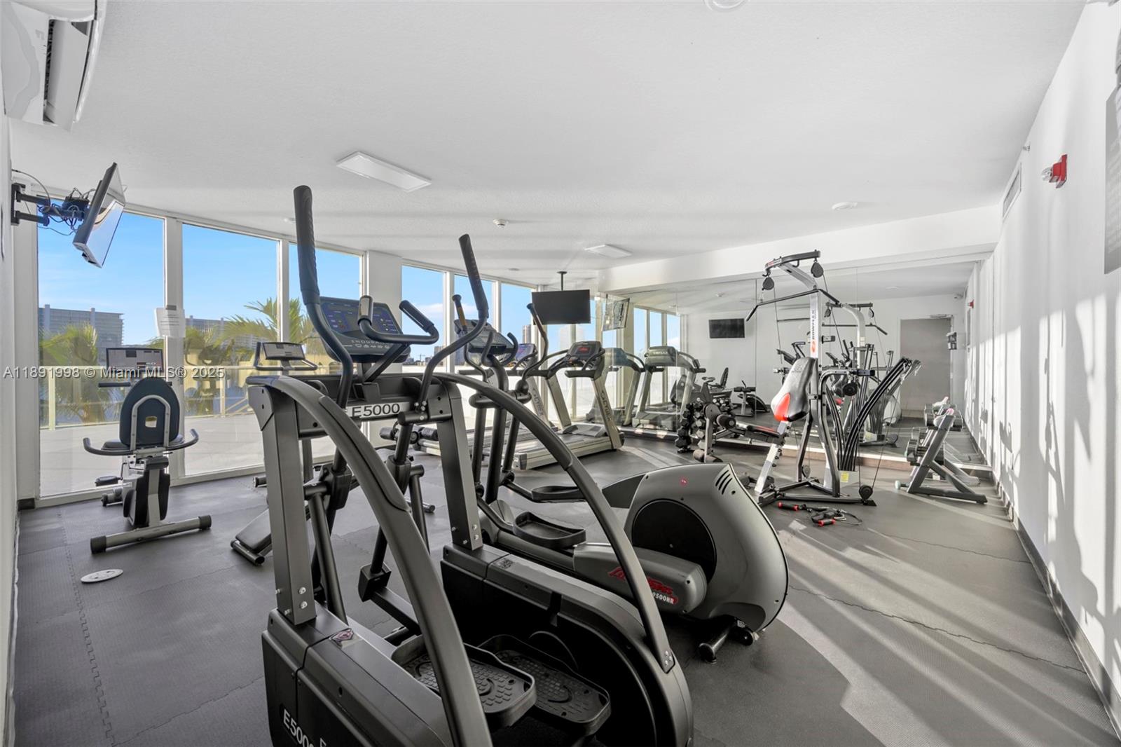 18100 North Bay Road, Unit 708 Sunny Isles Beach, FL 33160 - Photo 22 of 26 a view of a room with gym equipment