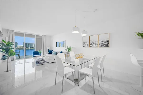 a view of a dining room with furniture