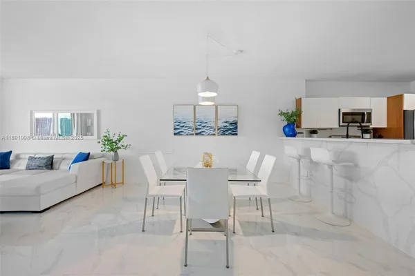 a view of a dining room with furniture