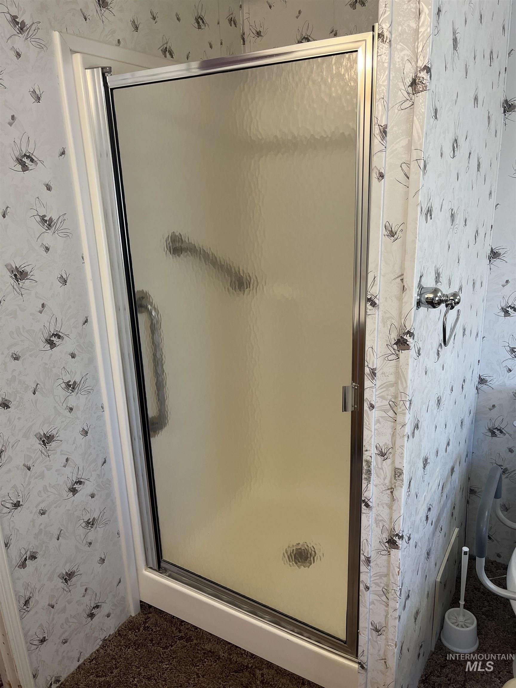 2750 Alden Road, Unit 34 Fruitland, ID 83619 - Photo 39 of 41 Full bath with wallpapered walls and a shower stall