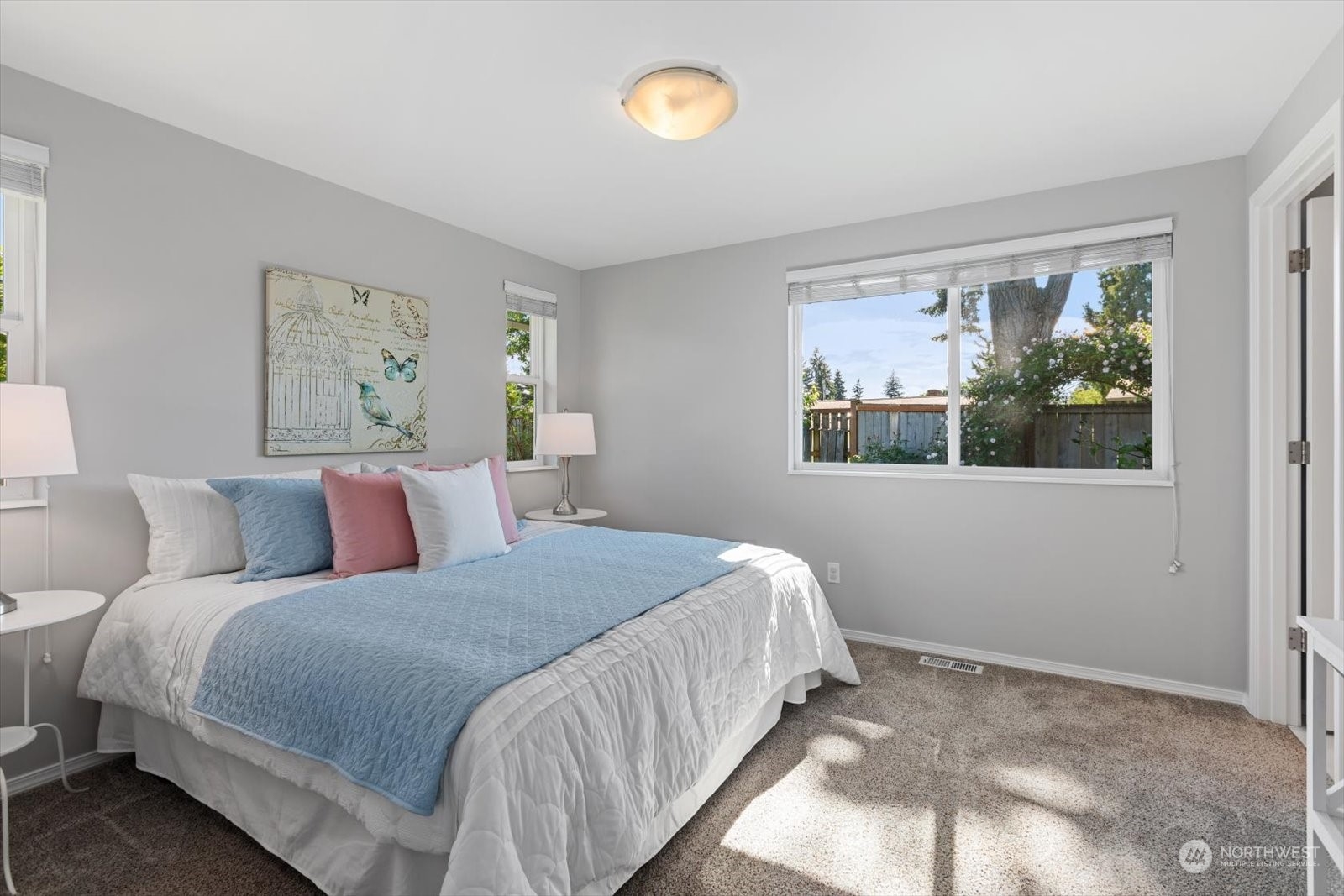 8630 217th Street Southwest Edmonds, WA 98026 - Photo 11 of 34 a bedroom with a bed and a window