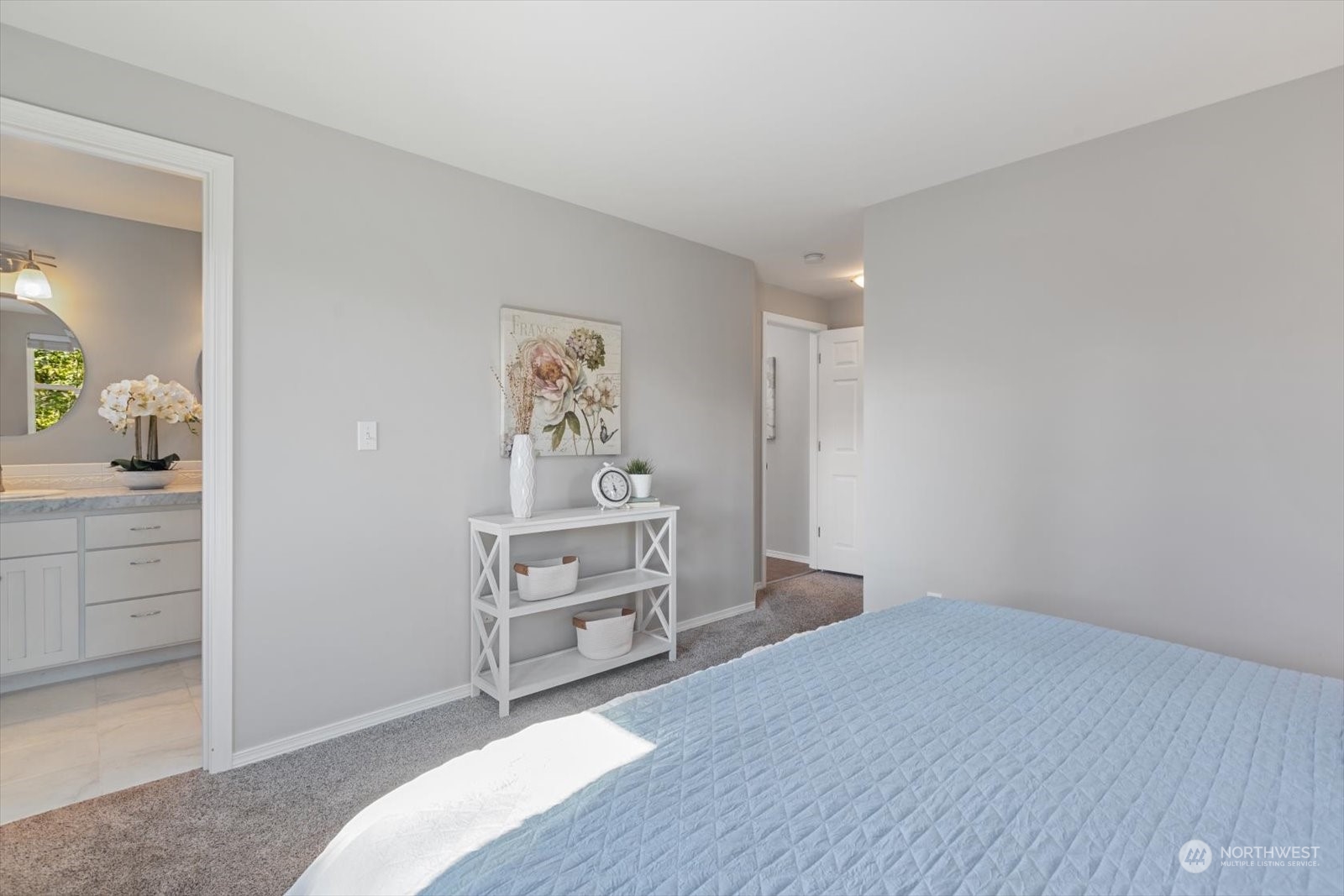 8630 217th Street Southwest Edmonds, WA 98026 - Photo 12 of 34 a bedroom with a bed and a dresser