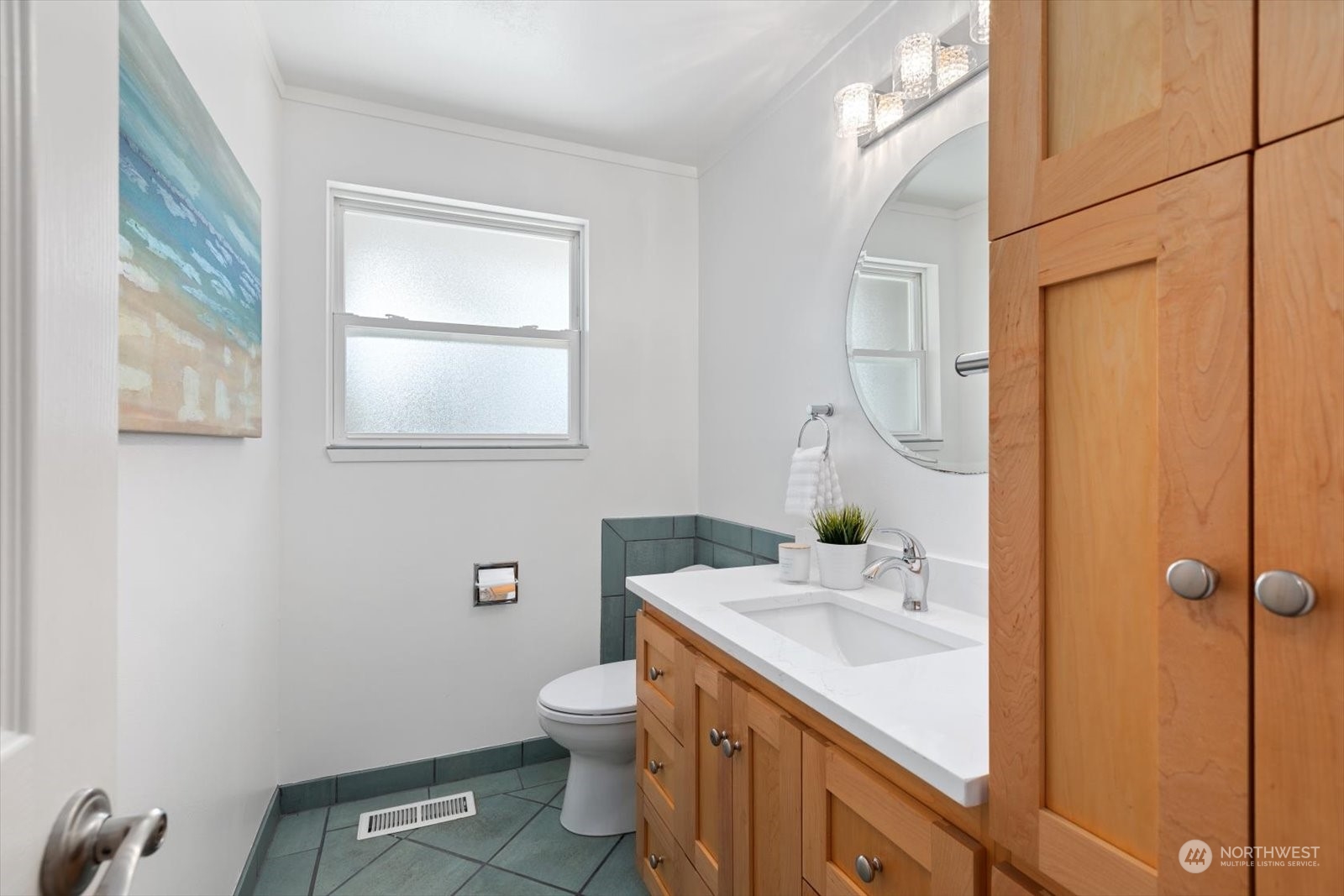 8630 217th Street Southwest Edmonds, WA 98026 - Photo 19 of 34 a bathroom with a sink a toilet and shower