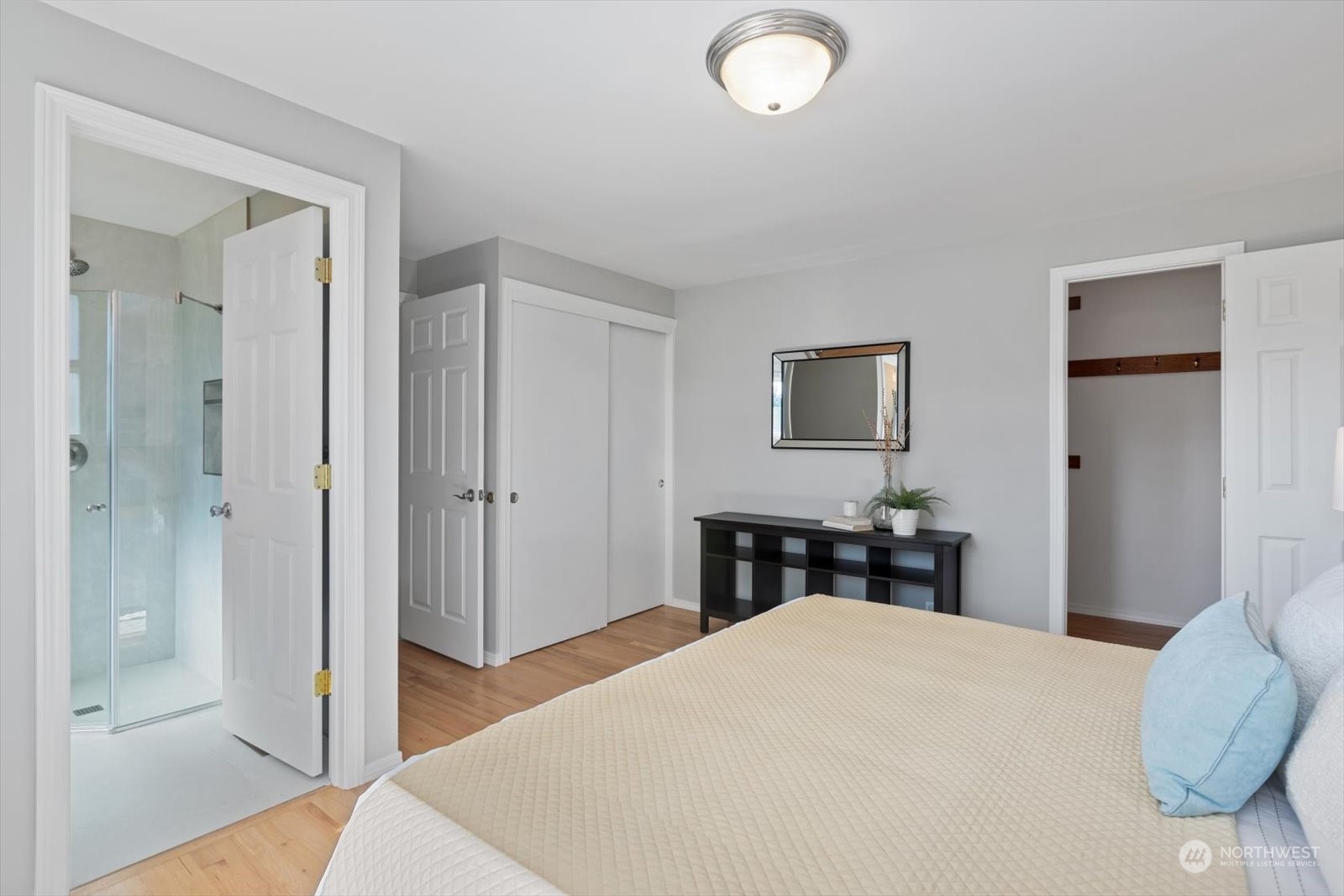 8630 217th Street Southwest Edmonds, WA 98026 - Photo 22 of 34 a bedroom with a bed and a dresser
