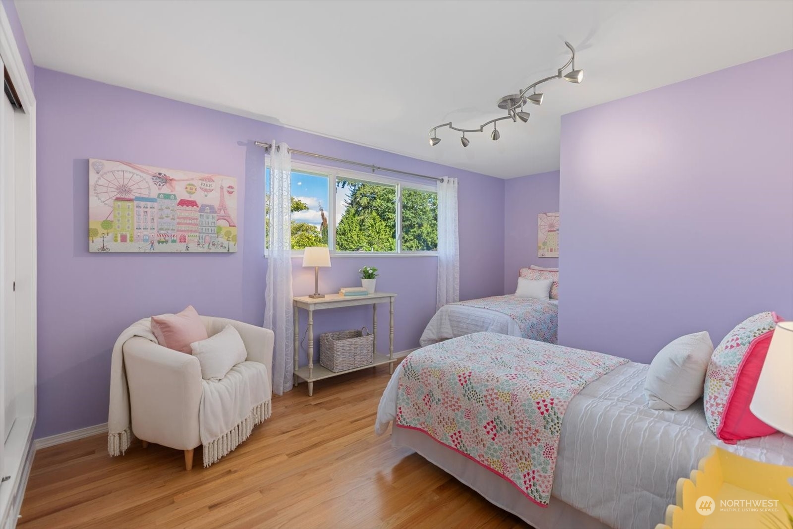 8630 217th Street Southwest Edmonds, WA 98026 - Photo 24 of 34 a spacious bedroom with a bed and a couch