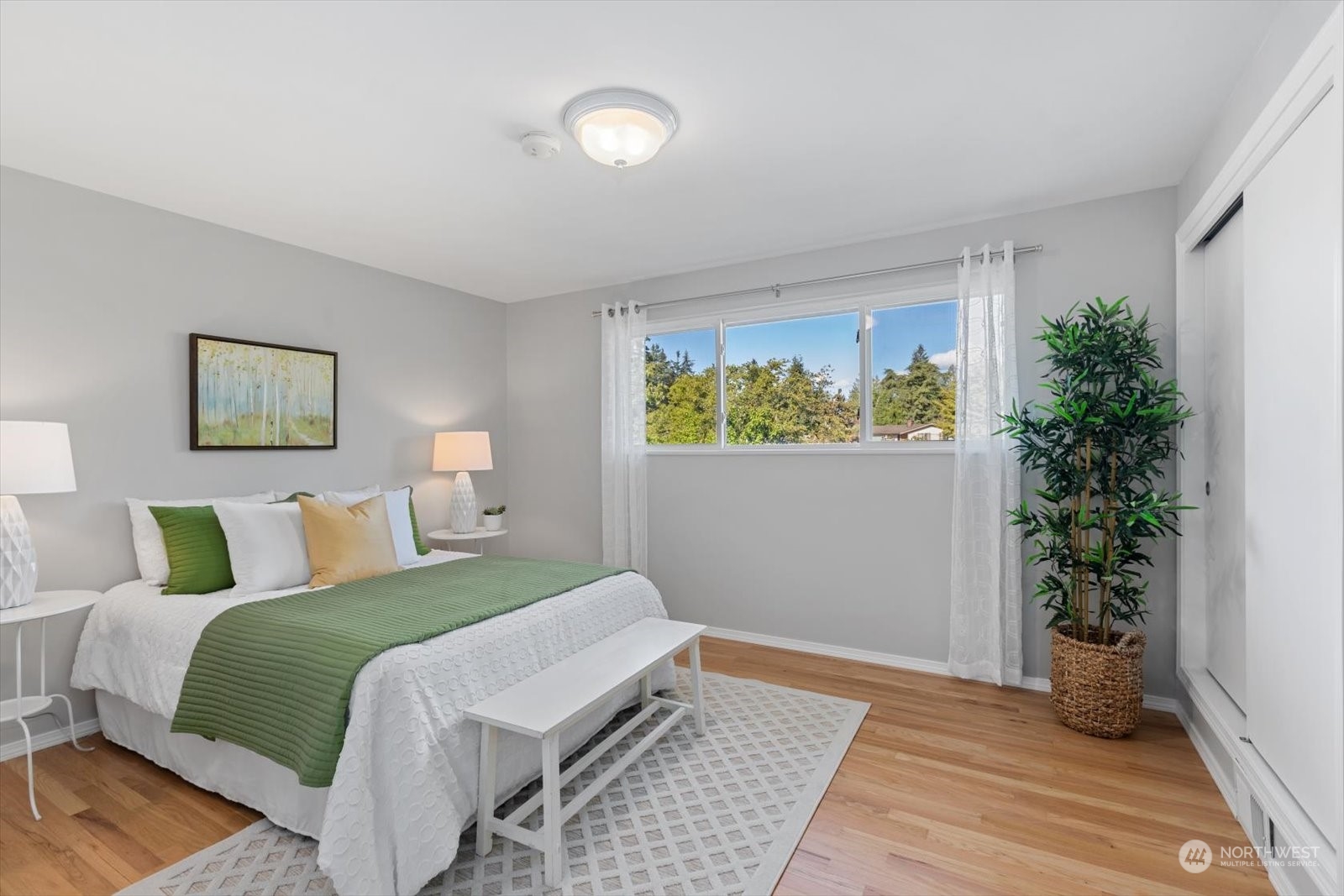 8630 217th Street Southwest Edmonds, WA 98026 - Photo 25 of 34 a bedroom with a bed and a window