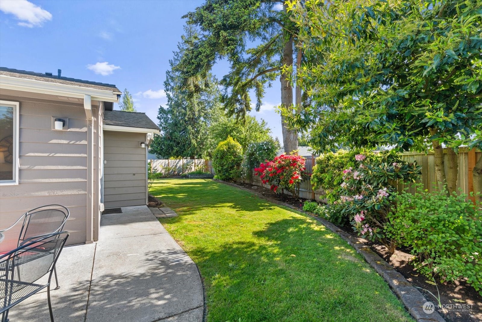 8630 217th Street Southwest Edmonds, WA 98026 - Photo 29 of 34 a view of backyard with garden and seating area