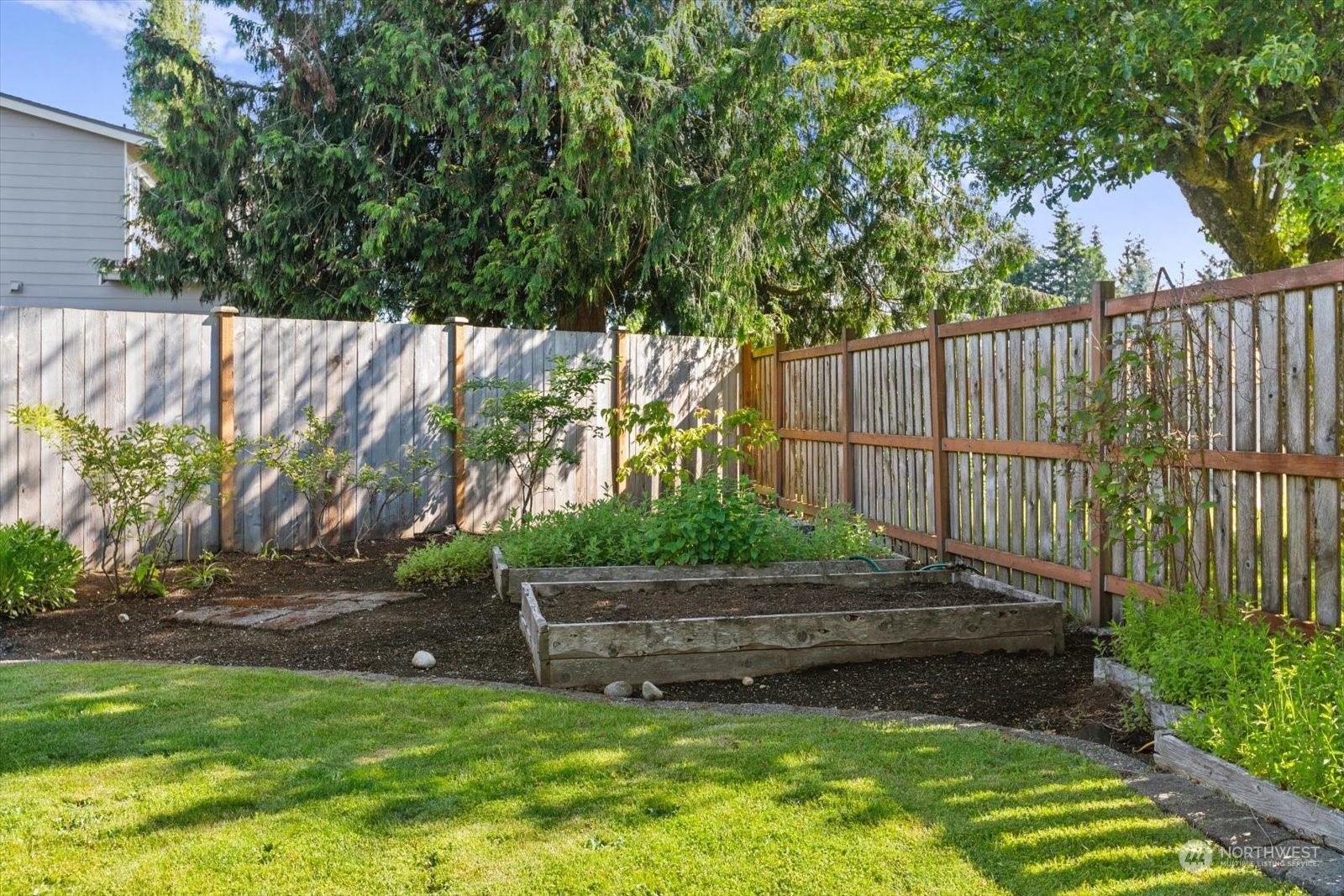 8630 217th Street Southwest Edmonds, WA 98026 - Photo 30 of 34 a backyard of a house with lots of green space