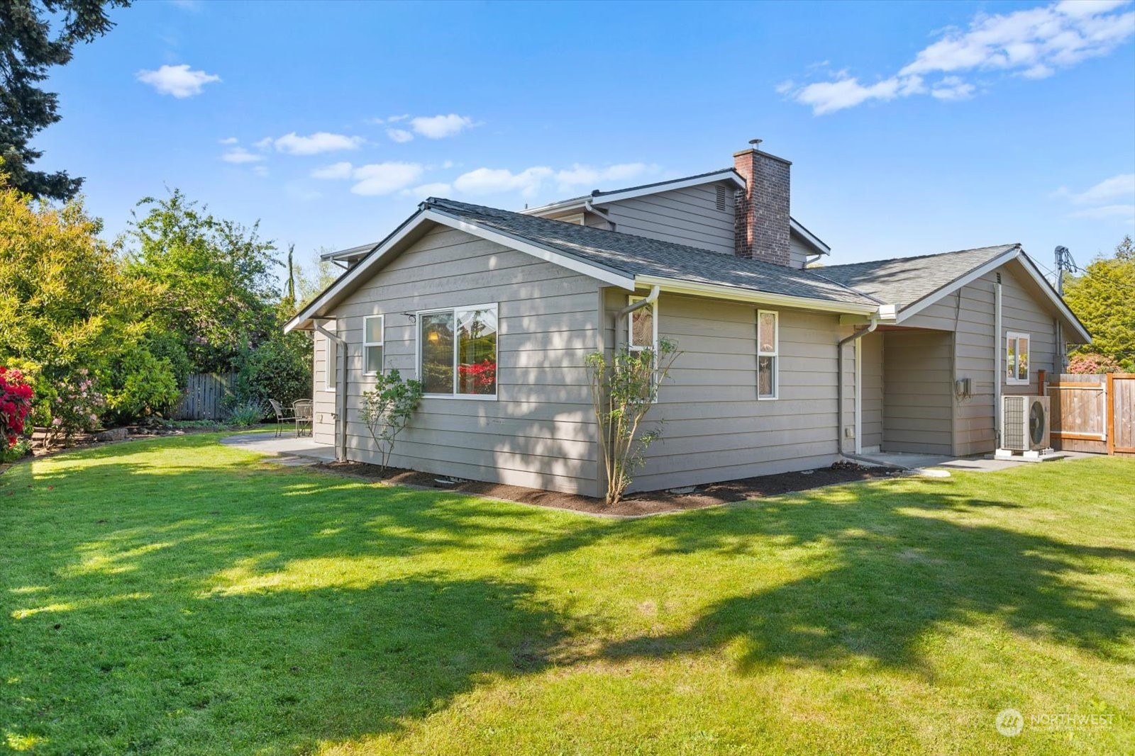 8630 217th Street Southwest Edmonds, WA 98026 - Photo 31 of 34 a view of a house with a yard