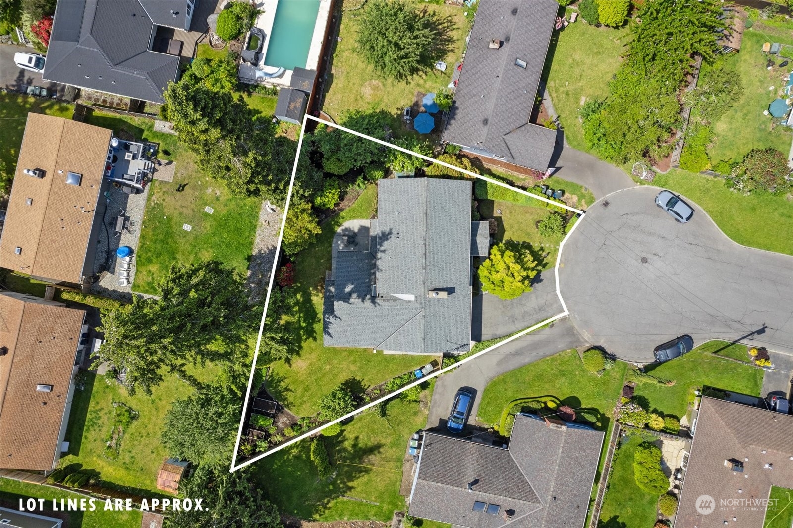 8630 217th Street Southwest Edmonds, WA 98026 - Photo 32 of 34 an aerial view of a house with a swimming pool