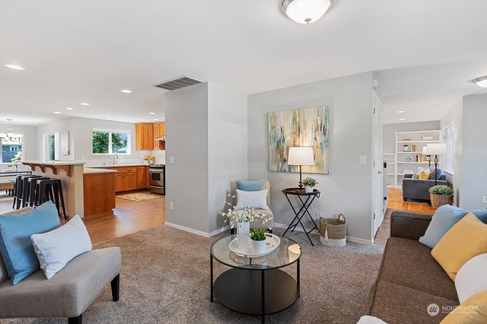 8630 217th Street Southwest Edmonds, WA 98026 - Photo 9 of 34 a living room with furniture and a table