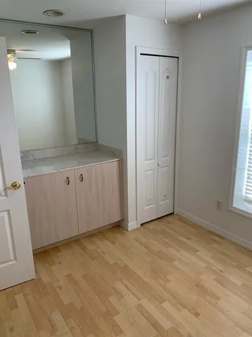 a bathroom with a toilet sink and shower
