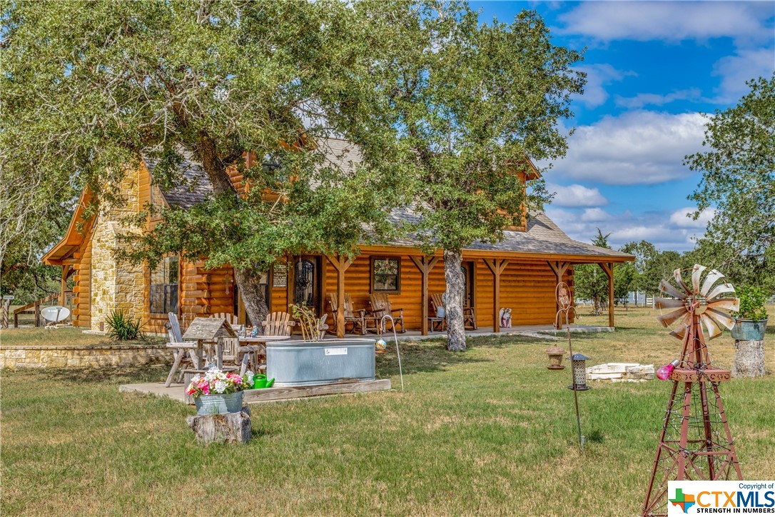 7790 State Highway 95 Flatonia, TX 78941 - Photo 1 of 1 a front view of a house with a yard