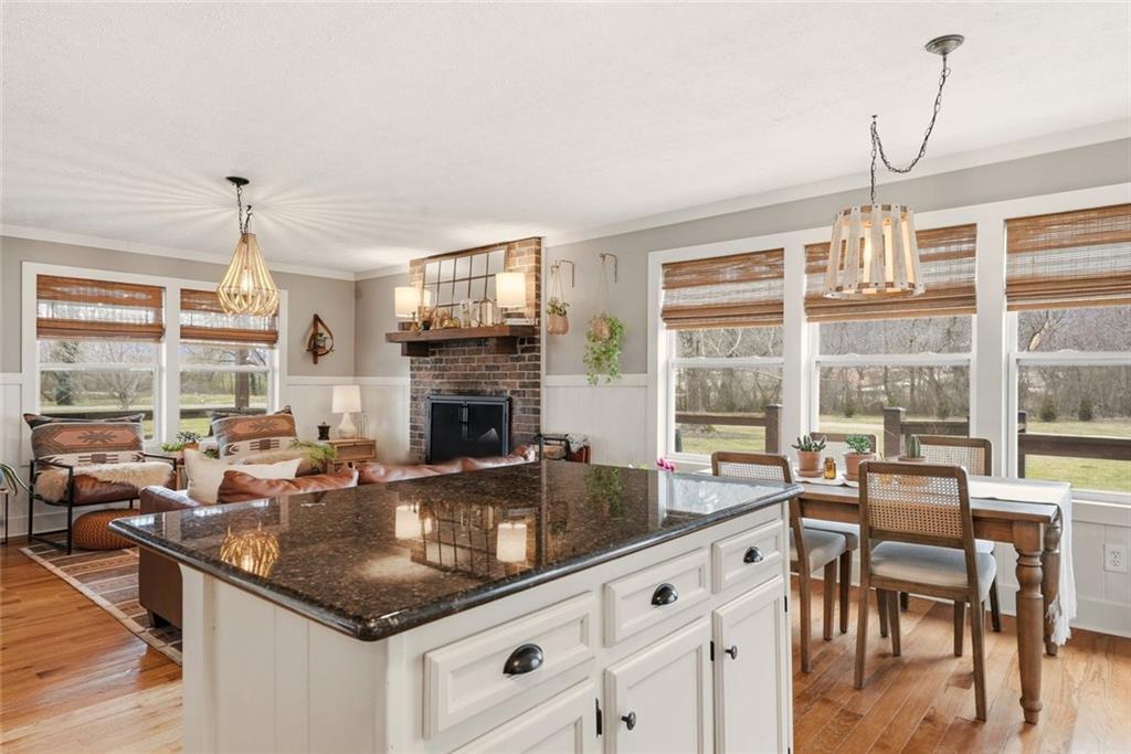 21 McIntosh Lane Rabun Gap, GA 30568 - Photo 15 of 50 a kitchen with granite countertop a sink and a stove