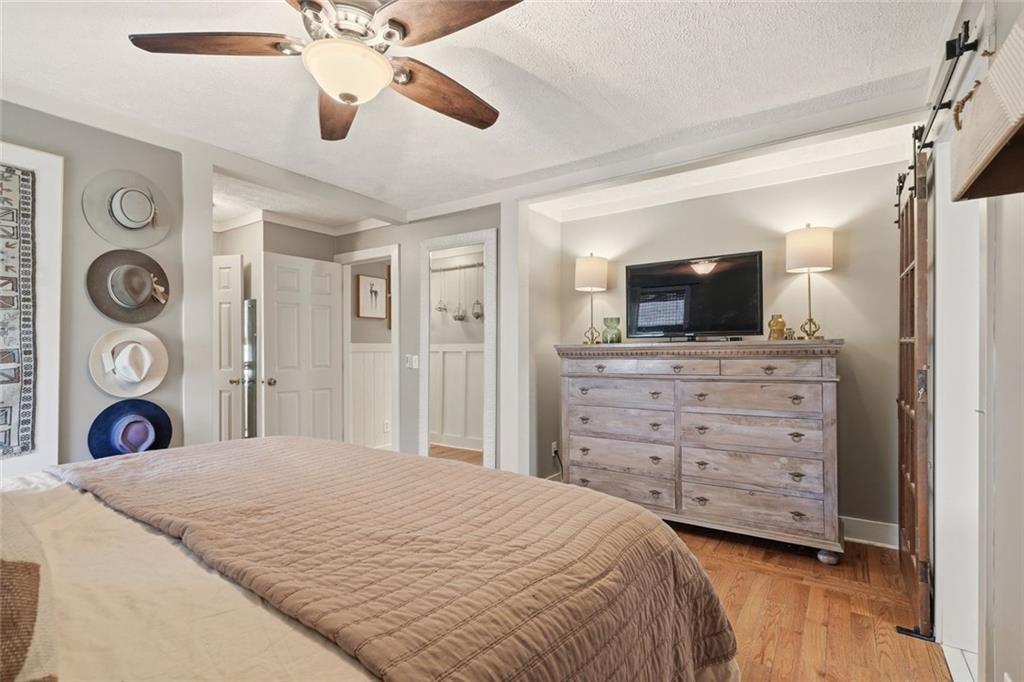 21 McIntosh Lane Rabun Gap, GA 30568 - Photo 23 of 50 a bedroom with a bed and a television