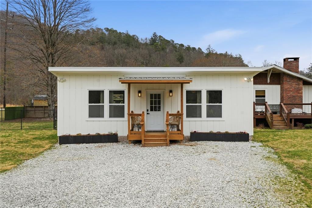 21 McIntosh Lane Rabun Gap, GA 30568 - Photo 39 of 53 a front view of a house with a yard